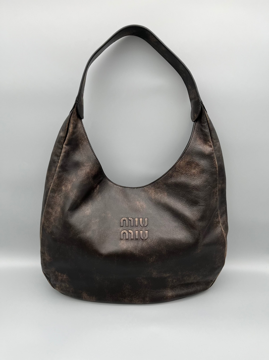 Miu Miu Hobo Bag Braun Leder – luxuriöse Designer Schultertasche exklusiv bei Einzelstck